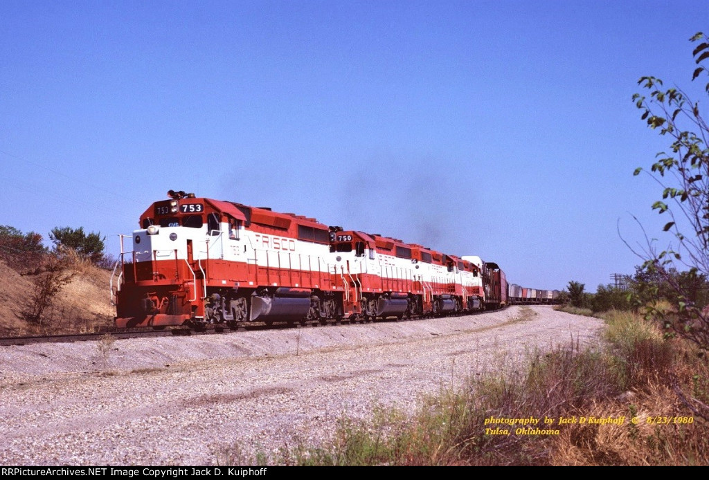 Frisco, SL-SF GP40-2s 753-750-768-772, just out of Cherokee yard and headed west at Tulsa, Oklahoma. August 23, 1980. 